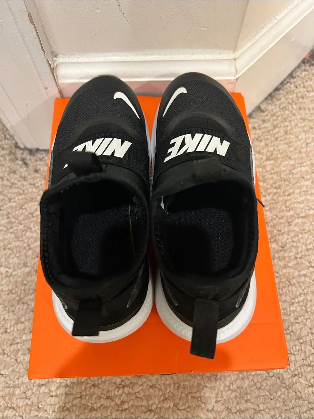 Kids Nike Black and White Slip-Ons